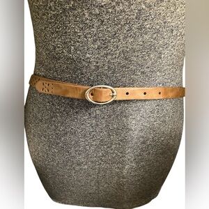 Tan belt with decorative cut outs
